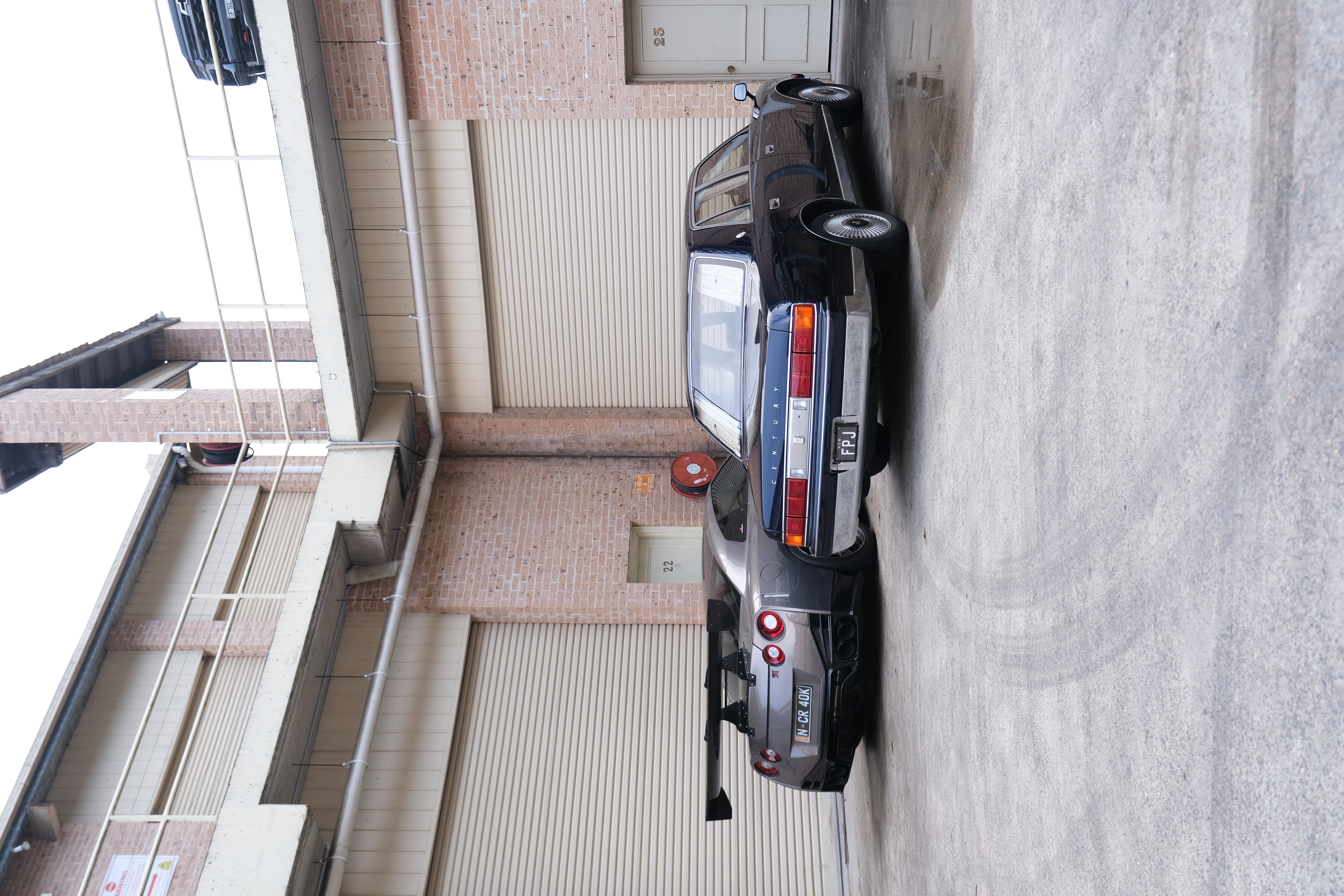 Nissan GT-R and Toyota Century side by side